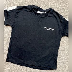 Black “dare to explore” tee
